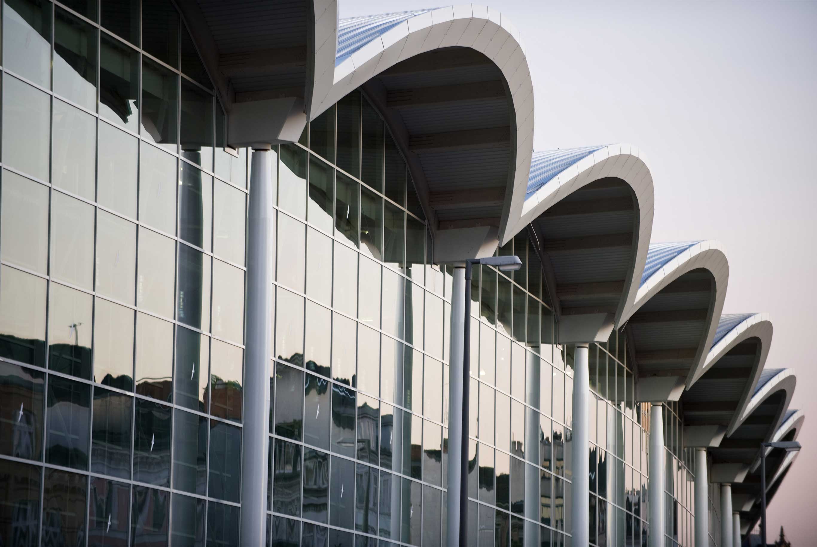 The exhibition halls in Hamburg from the front in the evening light with reflections