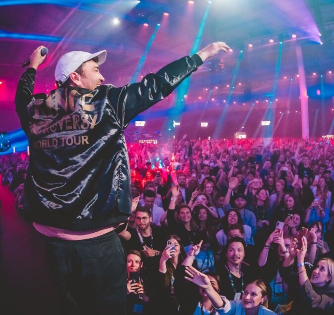 Rapper Marteria on stage in front of a cheering audience