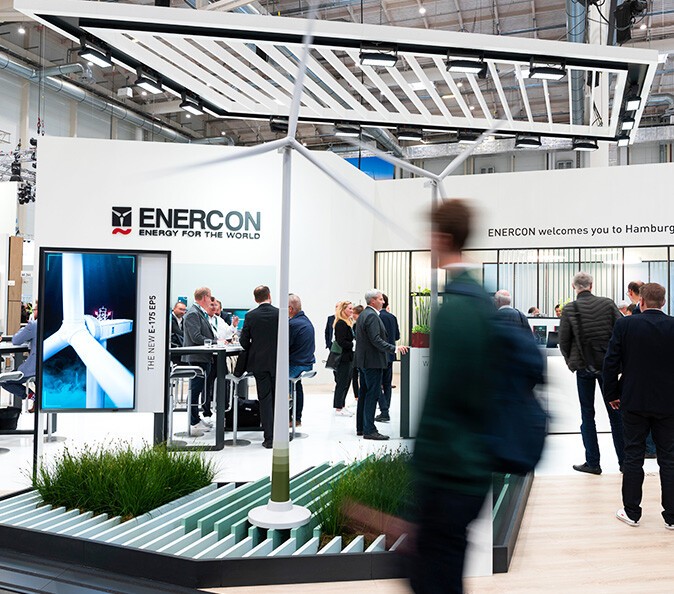 Visitors in front of a WindEnergy 2022 exhibition stand