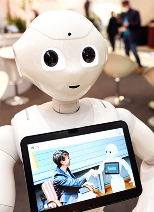 A service robot carrying a tablet