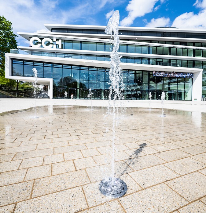 Exterior view of the new CCH, water feature in the foreground